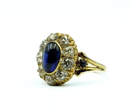 Geelgouden Russische diamanten ring met saffier